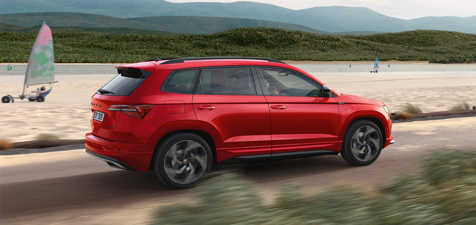 Red Karoq Sportline car driving