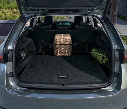 The boot of a Skoda with nets holding smaller items