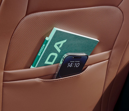Phones and tablets in the back of a seat